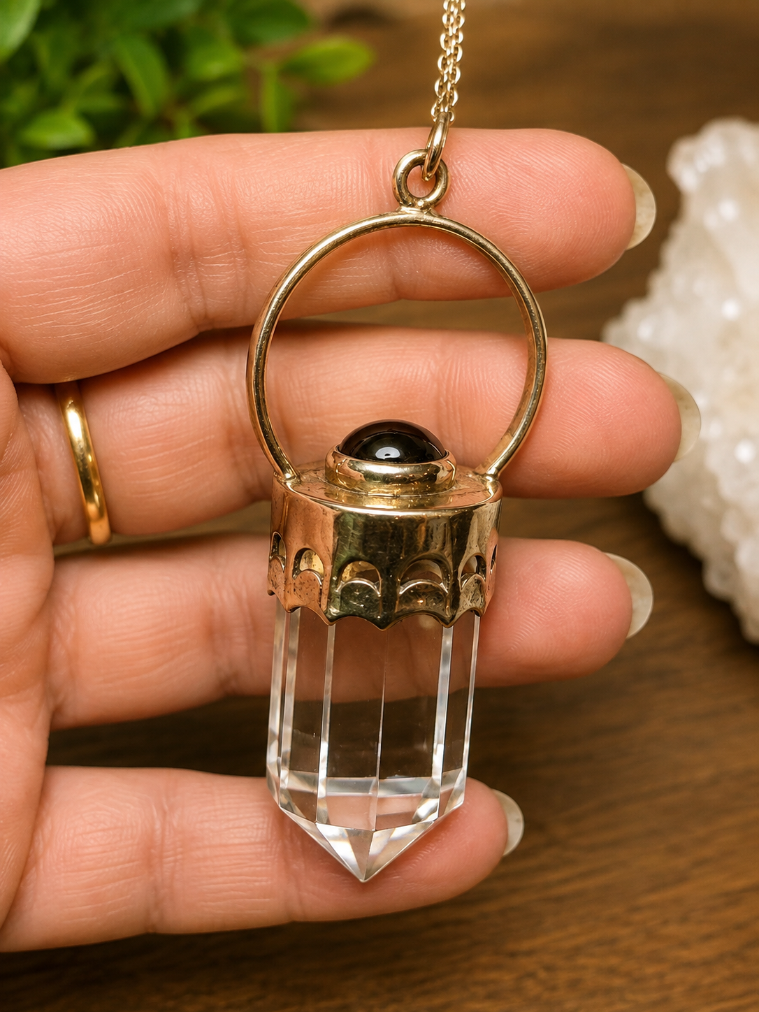 Pendule d’exception – Argent, cristal de roche et grenats
