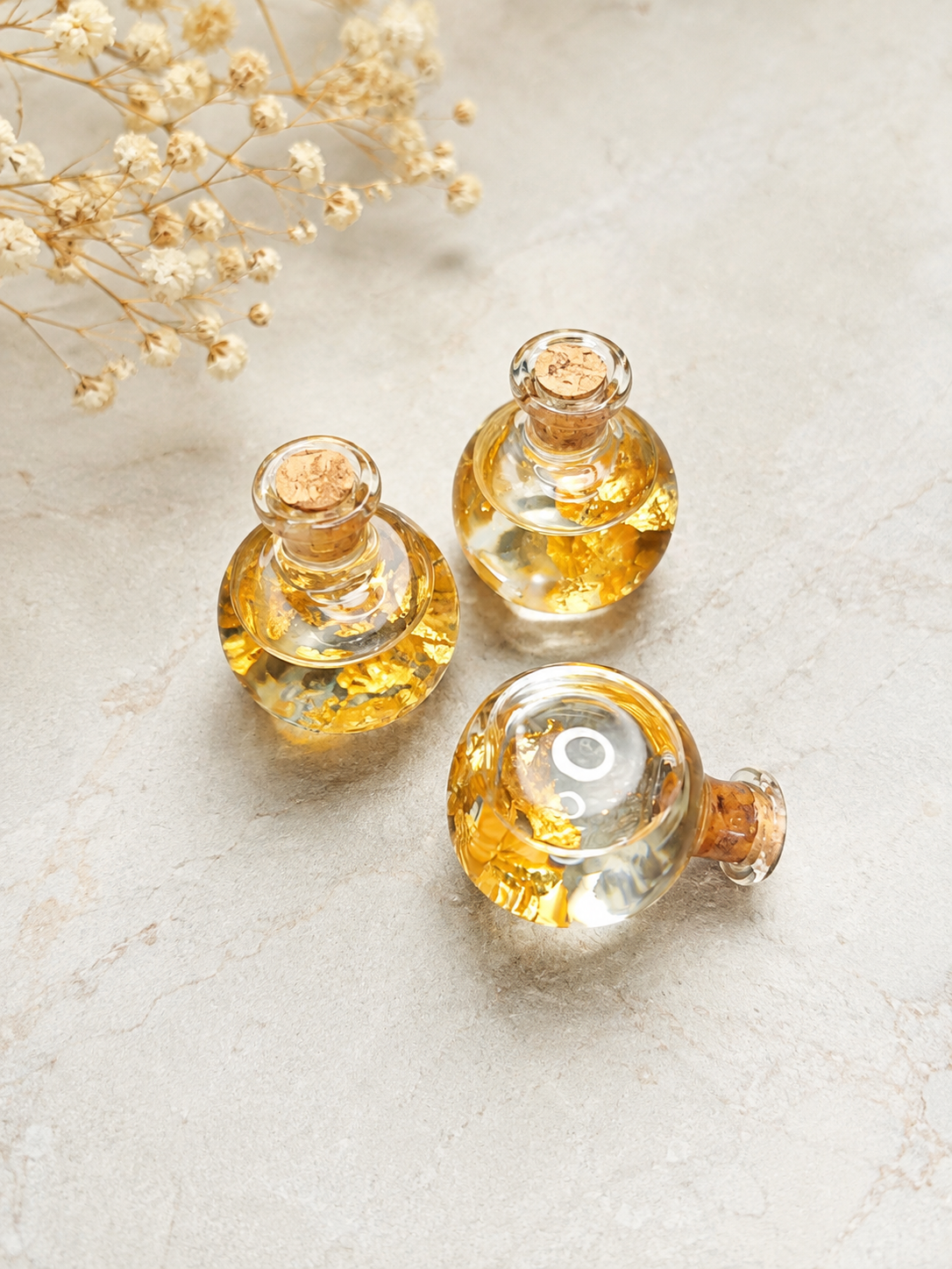 Petit flacon de feuilles d’or 22 carats